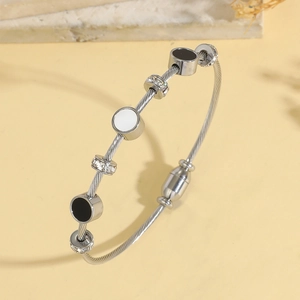 Minimalist silver steel wire rope bracelet with black and white enamel charms and pavé beads