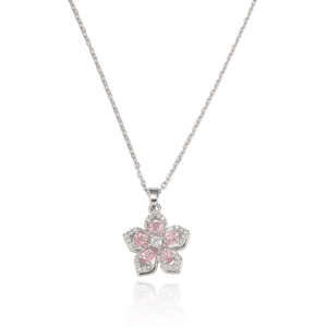 Detailed close-up of pink flower pendant with white zircon crystals on silver chain