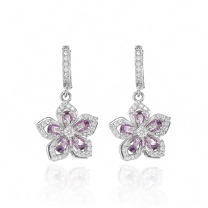 Macro shot of silver zircon flower earrings with purple petals and micro-pave crystals