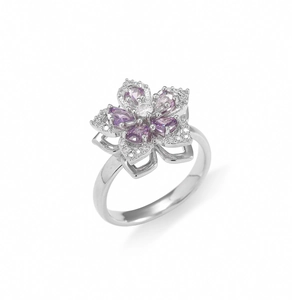 Macro view of rotating purple zircon floral pendant with detailed crystal setting