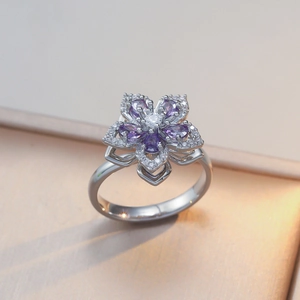 Rotating purple flower necklace with heart-shaped zircon stones in polished titanium steel