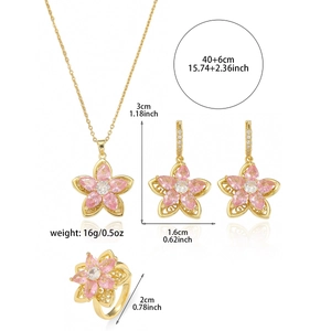 Detailansicht des rotierenden Blumen-Schmucksets mit Größenangaben und Gold-Finish