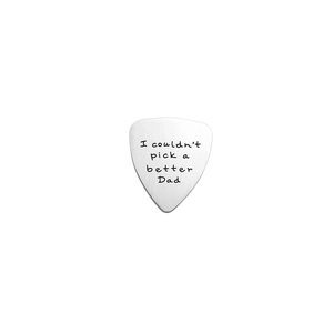 Detailed view of brushed stainless steel guitar pick with Dad quote engraving