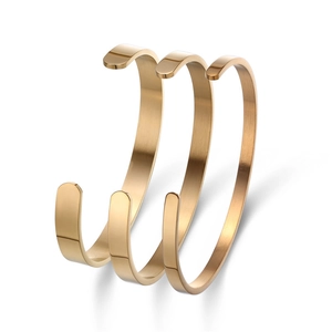 Three-piece set of polished golden C-shaped open bracelets in high-quality stainless steel