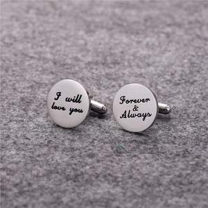 Polished round cufflinks with I will love you and Forever & Always engraving on felt background