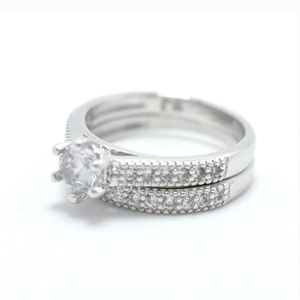 Classic silver bridal set with round-cut zircon stone and micro-pave eternity band