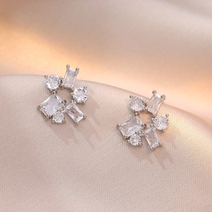 Elegant silver cluster stud earrings with round and rectangular zircon stones