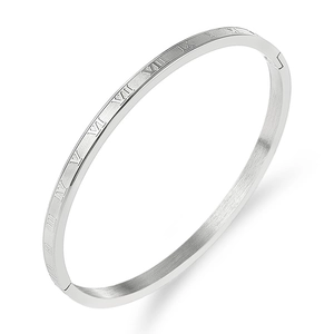 Macro detail of silver titanium steel Roman numeral bangle with brushed metal finish