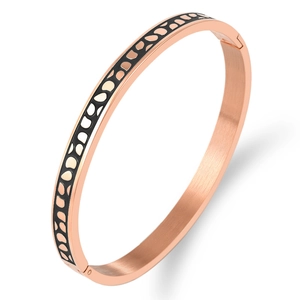 Bracelet en acier inoxydable or rose avec points en émail noir et texture brossée