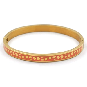 Bracelet jonc en acier inoxydable doré avec émail orange et motifs de taches dorées