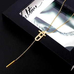 Elegant gold-plated stainless steel Lariat necklace with sparkling geometric CZ pendant