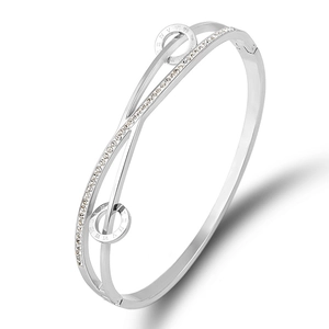 Silver stainless steel crisscross bracelet with Roman numeral rings and crystal accents