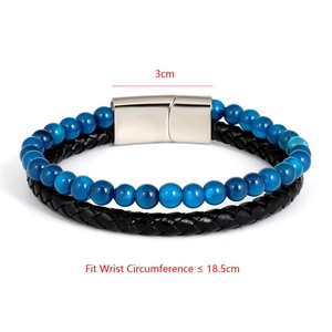 Detail view of double-layer beaded tiger eye and braided leather bracelet with 3cm clasp