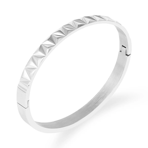 Punk style silver stainless steel bangle featuring 3D pyramid rivets and hinge clasp