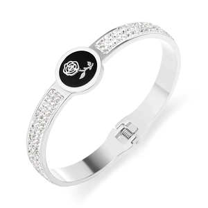 Polished silver spring cuff bracelet featuring a black rose shell and zircon accents