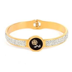 Golden rose shell spring bracelet with sparkling rhinestones and black floral inlay