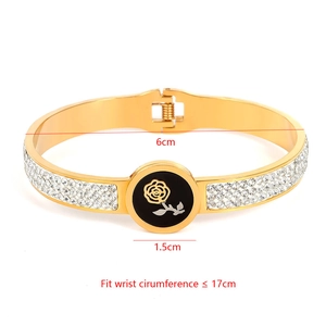 Detailed view of gold rose shell spring bracelet with 6cm inner diameter and rhinestones