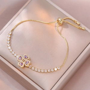 Bracciale regolabile in oro rosa con ciondolo a fiore in zirconi viola per donna