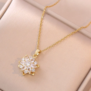 Rotating sunflower necklace with sparkling zircons on a gold-plated dainty chain