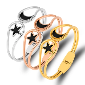 Star and moon stainless steel hinged cuff bracelets set in gold, silver and rose gold