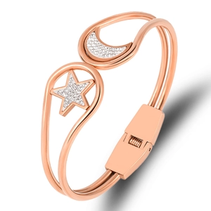 Rose gold stainless steel open bangle with crystal pavé star and moon design