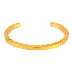 Bracciale rigido in acciaio inossidabile dorato con incisioni a stella geometriche