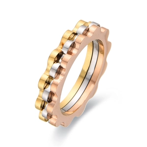 Three-tone wave gear ring in gold silver and rose gold polished stainless steel