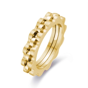 Golden wave gear titanium steel ring with industrial chain texture in minimalist style