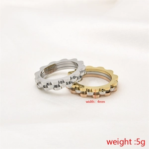 Detail view of 4mm wave gear rings in silver and gold steel with size dimensions