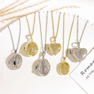 Locket necklaces with celestial and religious motifs in gold and silver finish