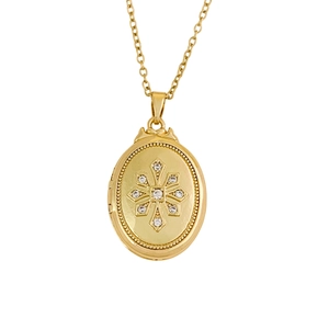 Golden oval locket necklace with snowflake star pattern and crystal inlay on white background