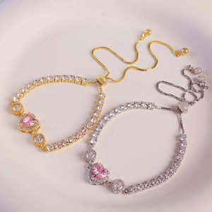 Adjustable tennis bracelets with pink heart zircon pendant in gold and silver finish