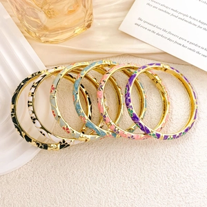 Set of six vintage Cloisonné enamel bangles with floral patterns and gold plating