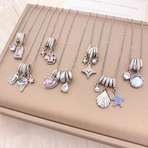 Elegant silver pendant necklace collection with colorful zircon and sea life motifs