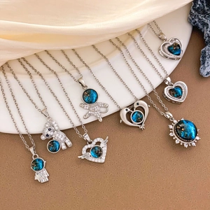 Starry night galaxy themed silver stainless steel pendant necklaces with blue gemstones