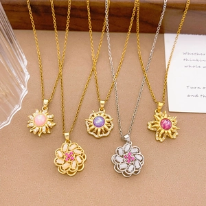 Rotating sunflower necklaces with crystal inlay in gold and silver plating