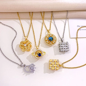 Drehbare Planeten- und Herz-Halsketten in Gold und Silber mit Zirkonia-Besatz