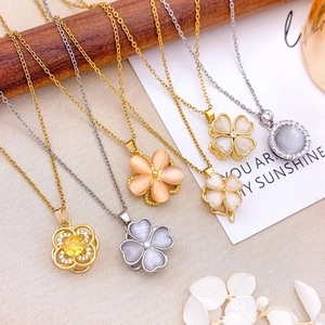 Chic rotating cat eye stone flower necklaces in gold and silver finish for women
