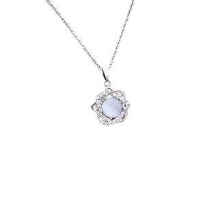 Rotating opal flower necklace in silver with sparkling zircon accents on white background