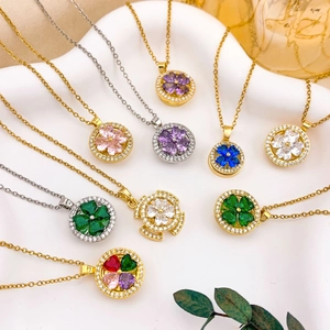 Collier trèfle à quatre feuilles rotatif avec zircons colorés en or et argent pour femme