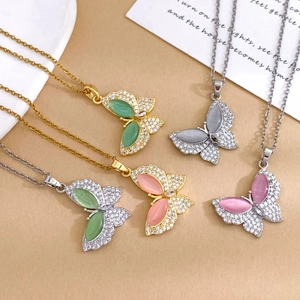 Elegant butterfly pendant necklaces with opal wings and rhinestones in gold and silver