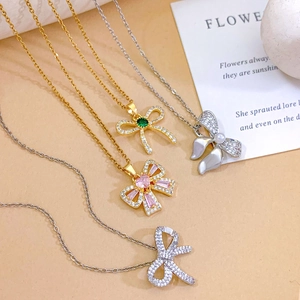 Exquisite bow-shaped zircon necklaces in gold and silver finish with elegant gemstones