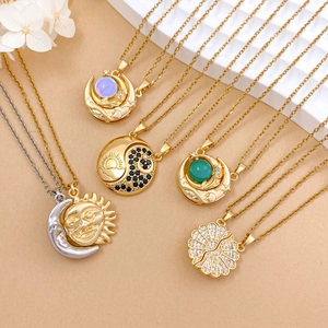Celestial sun and moon necklaces with gemstones and crystals on a golden chain