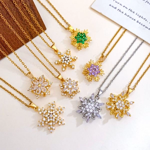 Drehbare Schneeflocken-Halsketten aus Gold- und Silberstahl mit bunten Zirkonias
