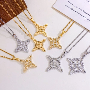 Polished Celtic knot and star necklaces in gold and silver steel with zircons
