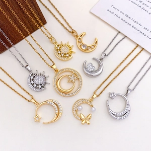 Elegant gold and silver celestial necklaces with moon, star and heart zircon pendants