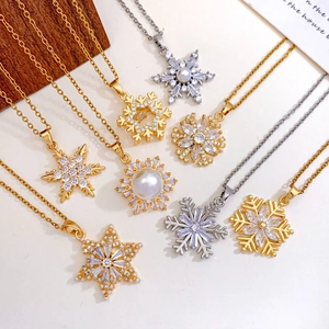 Elegant gold and silver snowflake pendant necklaces with pearls and zircons for women