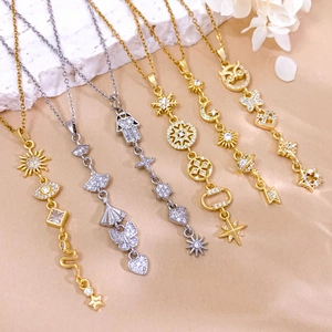 Bohemian gold and silver celestial necklaces with sun, moon, and snake charms set