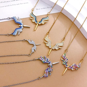 Cross and angel wing necklaces with colorful cubic zirconia stones in gold and silver