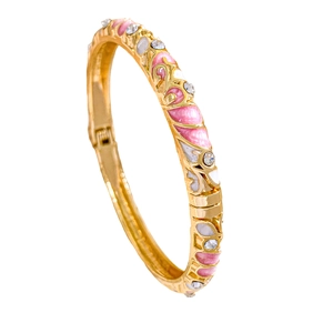 Retro hinged gold bangle with pink enamel floral patterns and sparkling gemstones
